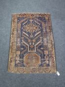 An old Baluchi rug 124 cm x 86 cm