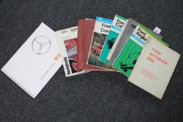 A group of vintage car manuals, Ford Anglia, Austin Cambridge, Ford Cortina and Corsair etc,