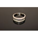 An 18ct white gold diamond half eternity ring, size R/S.