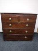 An early Victorian inlaid mahogany five drawer chest