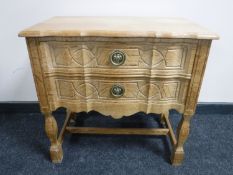 A light oak two drawer chest