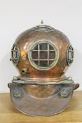 A copper deep sea diver's helmet