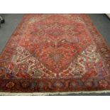A large Heriz carpet,