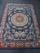 A Persian design carpet on blue ground