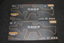 Two boxed Regimental Police SMG 9 toy guns