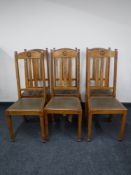 Six early 20th century oak dining chairs