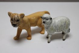 A Beswick china figure - Lion cub, facing left, model 2098, height 10 cm,