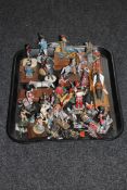 A tray containing a collection of cast lead soldiers