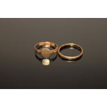 A 22ct gold band ring, 1.5g, and an 18ct gold ring, 1.