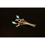 An 18ct gold diamond and turquoise floral spray brooch, 8.5g.