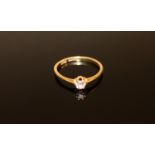 An 18ct gold solitaire diamond ring, size Q, 2.2g.