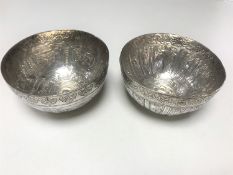 A near pair of Indian silver bowls