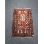 An old Baluchi rug 134 cm x 86 cm