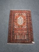 An old Baluchi rug 134 cm x 86 cm