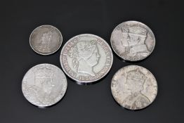 A silver 20 Reales 1859, together with four Victorian and later silver coins.