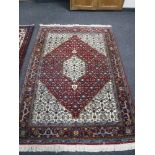 A Tabriz design rug