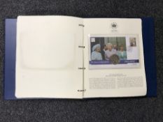 An album containing a coin cover collection - The Queen's Golden Jubilee 1952 - 2002.