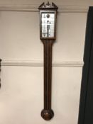 An inlaid mahogany barometer by Russell of Norwich