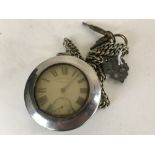 A silver pocket watch English Lever, suspended upon a chain with two keys.