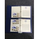 Two folders containing a quantity of European coins