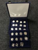 A blue fitted coin case containing twenty three British,
