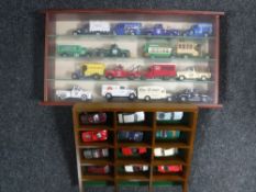 Two display cases containing die cast matchbox cars
