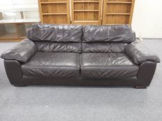 Brown leather three seater and two seater settees
