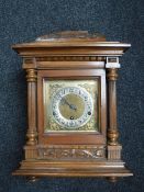 An Edwardian oak bracket clock