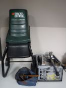 A Black and Decker garden shredder together with a box containing a small quantity of hand tools,