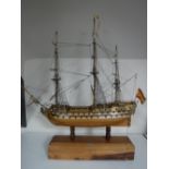 A wooden model of San Jaun Netomuceno three masted sailing ship on stand