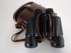 A set of leather cased Ludinus 10 x 50 binoculars