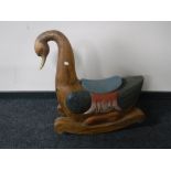 A hardwood rocking toy of a swan CONDITION REPORT: Restorations to neck.