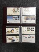 Two albums of Royal Mail first day covers - Classic Toys, Hampton Court Palace, etc, etc.