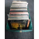 A crate containing a large quantity of 12" vinyl L.P.