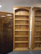 A set of pine open shelves,