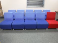 A set of ten reception chairs (nine blue one red)