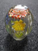 An early twentieth century glass paperweight