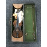 An antique violin and bow in hard carry case CONDITION REPORT: 14" back.