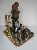 A tray of early twentieth century chalk figure, plated tea service, pair of brass candlesticks,