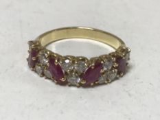 An 18ct gold ruby and diamond ring,