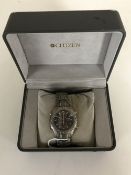 A Citizen gentleman's Titanium Eco-drive wrist watch, boxed, with papers.