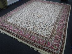 A fringed Indian carpet