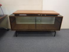 A mid 20th century Formica topped shop display cabinet