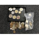 A collection of nine various coins in plastic cases together with a bag of miscellaneous loose