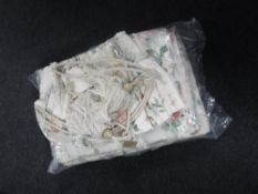 A pair of John Lewis floral patterned curtains with pelmet and tie backs