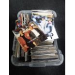 A crate containing a large collection of 45 rpm vinyl singles - Erasure, Status Quo, Roxy Music,