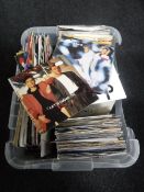 A crate containing a large collection of 45 rpm vinyl singles - Erasure, Status Quo, Roxy Music,