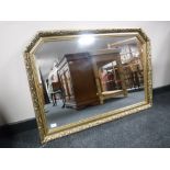 A gilt-framed overmantel mirror, 74 cm x 104 cm.