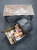 A walnut Oriental style coffee table together with a box of vintage dolls, hat box with hat,