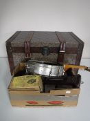 A vintage style trunk together with a box of banjo frame, carved oak barometer,